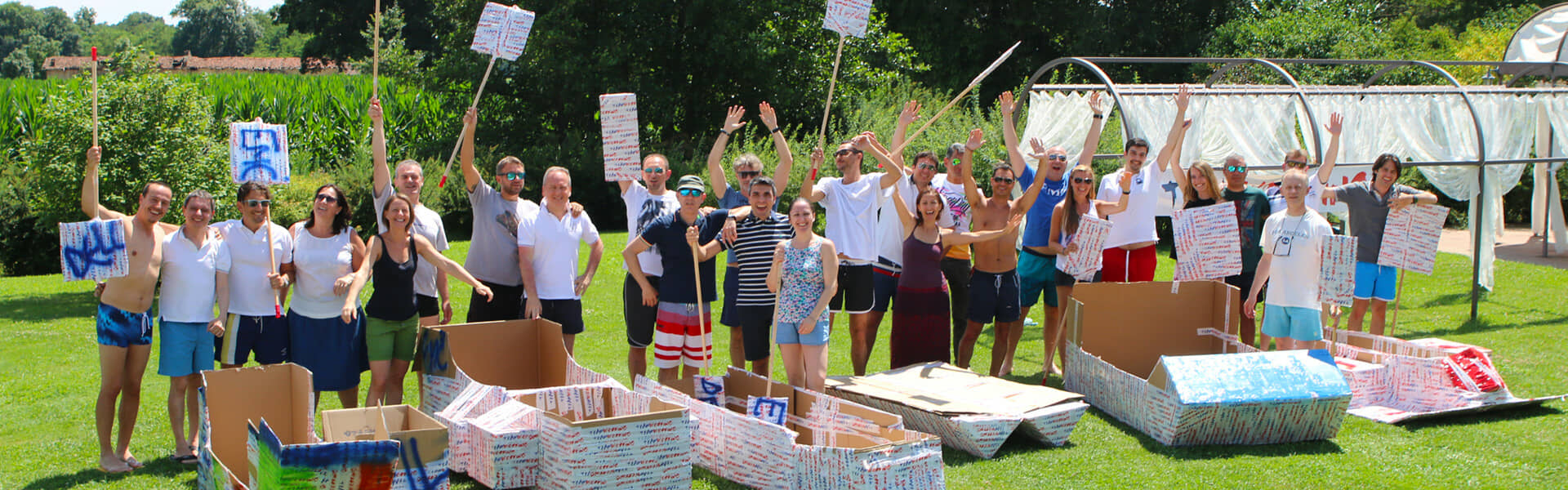 A cardboard boat built by a team, at the water for the final test